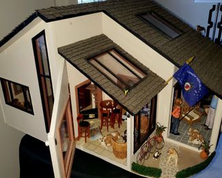 MCM Doll House 1ft =1 Inch scale
Sheila’s love for miniatures began nearly 40 years ago. She totally fell in love with the hobby when she first held a miniature dollhouse chair. With attention to every detail, most of the miniatures were created in the authentic style of their time period and culture. Her first project was an authentic 1800’s log cabin which is now on display in the Taylor Historical Museum. Numerous other projects include an authentic Spanish style house and the impressive Queen Anne dollhouse, which was donated to the Wyandotte Historical Museum.