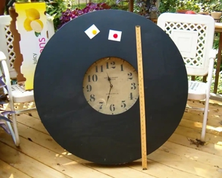 Pottery Barn metal wall clock. 38-inch diameter overall. Clock face is 14.25 inches. 