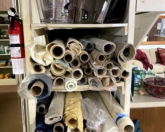 Bolts of drapery fabric, Kirsch hardware