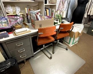 Vintage steel desk and 3 orange office chairs
