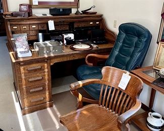Antique roll-top desk, antique oak office chair, tufted leather office chair