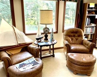 Pair of Bradington-Young chairs with footstools. Large sailboat model, nautical lamp and other decor.