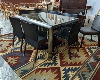 Mid Century Expanding Glass and Steel Dining Table with 8 Chairs