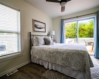 Urban chic queen bed with great headboard; contemporary fan with light