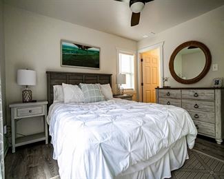 Beautiful master bedroom suite: tall dresser detail.