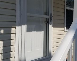 Exterior door with electronic lock & storm door