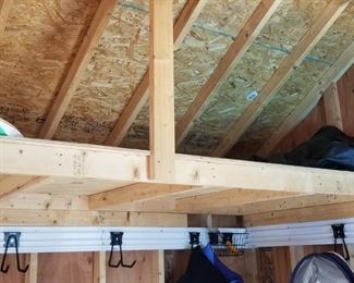 Nearly new 16' x 20' shed has a loft for extra storage!