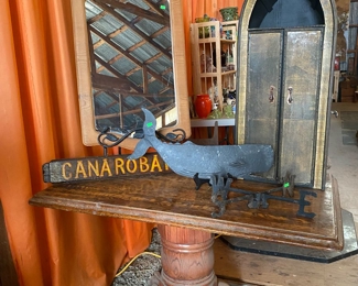 Antique Whale Weather Vane and Antique lion foot oak table