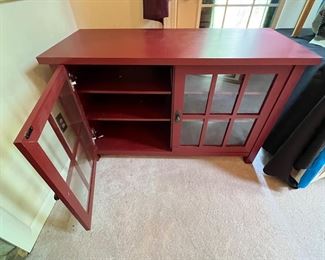 Red cabinet w window pane doors