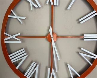 Large orange wall clock