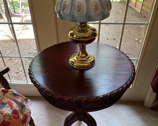Mahogany drum table
Brass Aladdin lamp and shade not electrified
