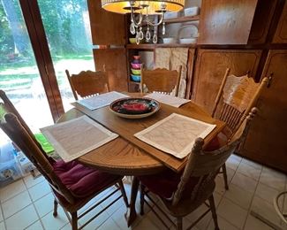 Oak kitchen table with oak leaf
8 oak chairs total
