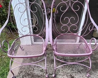 Pink painted metal chairs