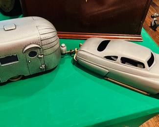 Vintage/Retro- 49’ Mercury and Aero Stream-
Talk about nostalgia! This set is rendered in fine, realistic detail from aluminum with bronze accents, including the car's removable trailer hitch. Aero Stream has functional door. Sold individually or in a set of two as shown.