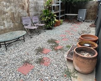 Glass tables, ceramic planters