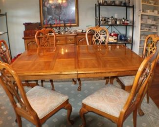 Thomasville dining table with six (or eight) chairs. 72" long as shown, plus two 22" leaves