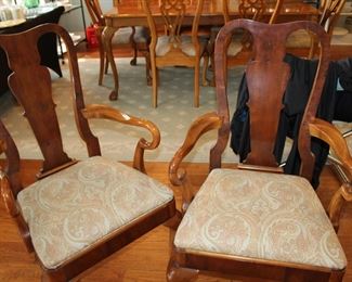 two optional dining armchairs; same finish and upholstery as the table and six