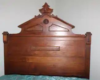 Eastlake bed (headboard and footboard). converted to queen size with iron rails