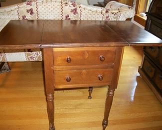 Drop-leaf sewing table