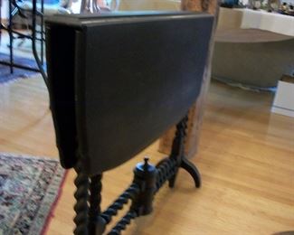 Folding table with spiral carved legs