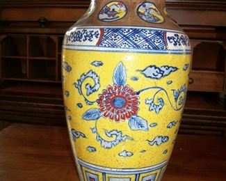 Yellow vase with gold accents