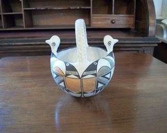 A two-spouted container used at weddings.