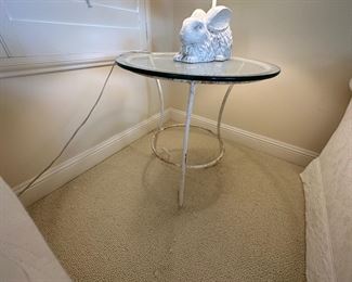 Metal base round glass top side table is 24 inches diameter
