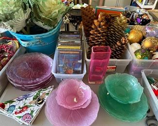 Set glass cabbage plates in purple, glass cabbage plates and bowls in pink and green, faux silk cabbage plants, lovely aqua pottery planter or ice bucket, DVDs, some new in pkg