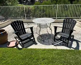 Round white fancy metal patio table measure 39 inches diameter, 2 tier great quality, the Adirondack chairs are rickety, and really rickety, terra cotta pot with saucer is 19 inch diameter