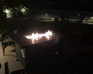 OW Lee Santorini fire pit at night