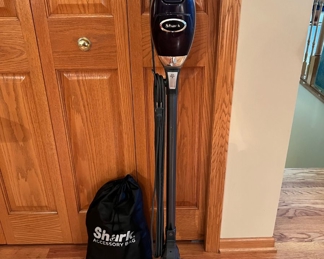 Shark Rocket DeluxePro vacuum with several attachments, most have never been used