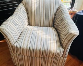 A fine swivel, upholstered chair.