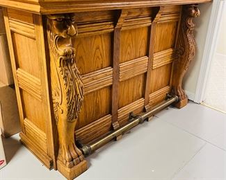 Antique carved oak bar.