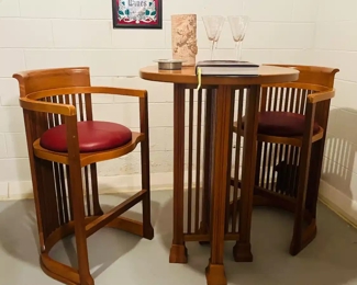 Artist made cocktail table and chairs.