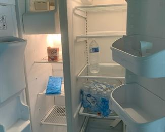 #47	Kenmore SXS Refrigerator - 36" wide - 25CU	 $75.00 			
