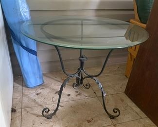 #48	Black Metal Base w Round beveled Glass Top - 30x24	 $75.00 			
