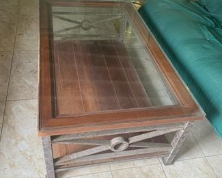 #49	Metal Base w/Loose Wood & Glass top Coffee Table - 49x29x19	 $40.00 			
