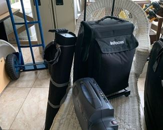 #57	In focus  LP725 Projector w/carrying Case & screen	 $50.00 			
