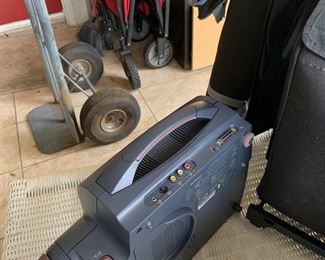 #57	In focus  LP725 Projector w/carrying Case & screen	 $50.00 			
