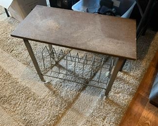 #98	mid century record rack table 24x12x20	 $20.00 			
