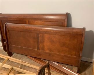 #104	king wood sled bed frame 	 $200.00 			
