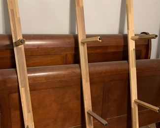 #104	king wood sled bed frame 	 $200.00 			
