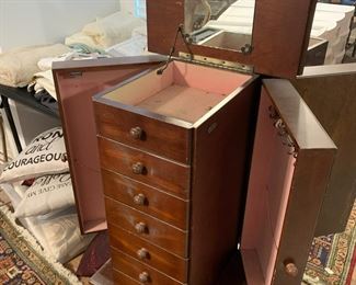 #109	jewelry cabinet with 6 drawers and flip top and 2 side doors 16x13x40	 $35.00 			
