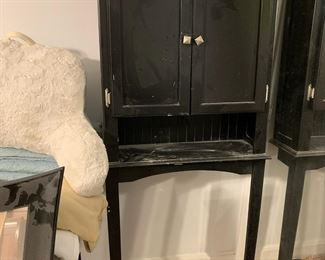 #112	over the toilet black shelf mounts on wall with leg 28x10x68	 $65.00 			
