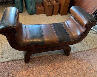 #118	end of the bed bench brown and black leather with nail head front 44x18x27	 $125.00 			
