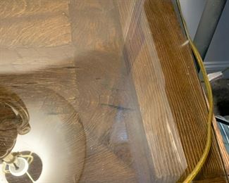 #122	iron base wood and glass top  24x20x23	 $80.00 			
