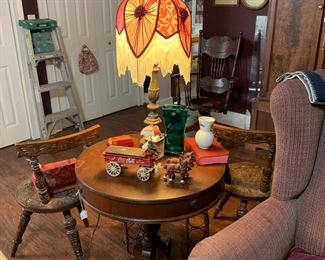 Round side table with claw feet 