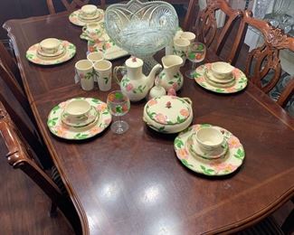 Dining table with 8 chairs and 1 leaf, Franciscan desert rose china  