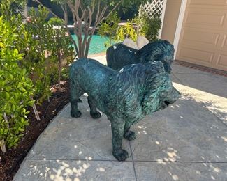 European bronze  lions.  Circa 1960s.  Each lion weighs over 300 lbs. and stands 44" tall  /  60" long.  This pair of lions were removed from an English Manor House and imported from England in the 1980's. 