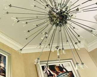 Eurofase
Style: Lenka 90 Light Extra Large Contemporary Chandelier
Chrome – #40676
Diameter: 54.5″
Height: 54.5″
Rod Length: 108″
Est. Weight: 92.93 lbs
Like raw precious gemstones from the earth, bursts of crystal spew forth in explosive forms, exuding modern energy. Comes with 3 x 36 inch rods